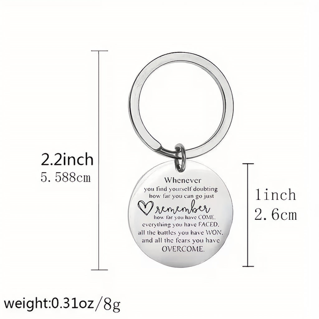 Silver keychain with motivational quote on a white background, mental health gift keychain