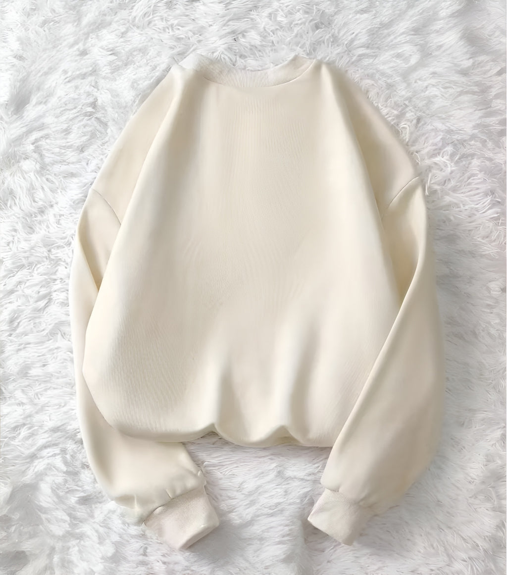 White sweatshirt on a white fluffy background