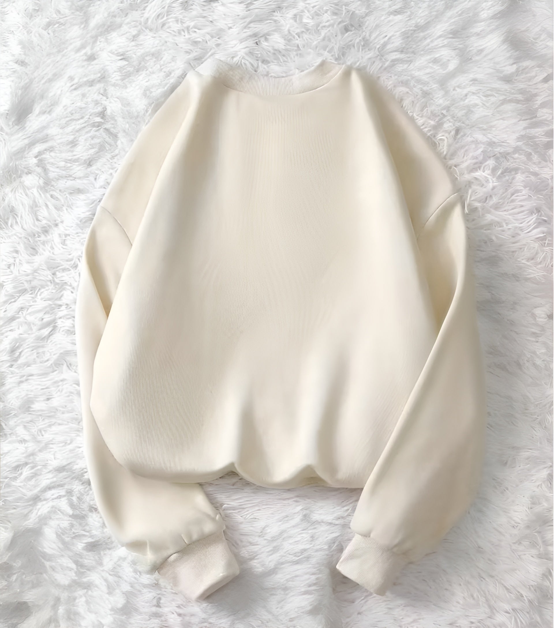 White sweatshirt on a white fluffy background