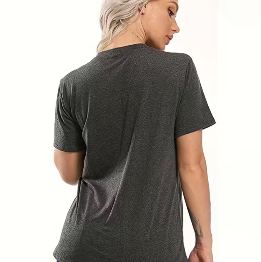 Person wearing a dark grey spiritual  t-shirt on a white background